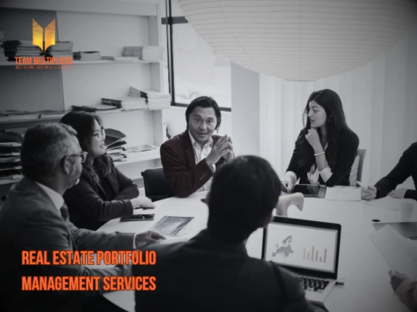 Team Meeting discussing Real Estate Portfolio